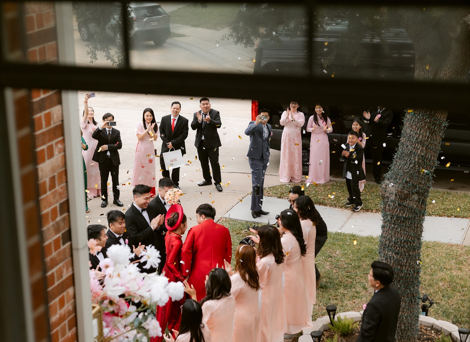 A quiet tea ceremony in a garden, hands meeting over a shared cup